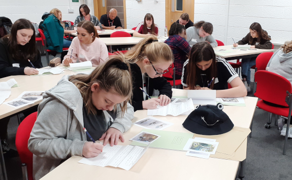 Groups of students cooperating on the Archives Alive workshop